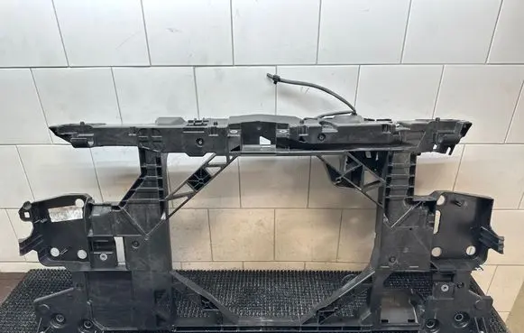 Radiator support slam panel
