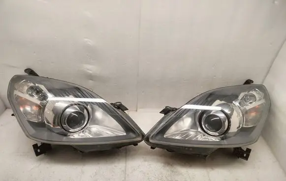Opel Zafira B Headlights/headlamps set 13252471
