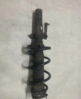 Front shock absorber with coil spring