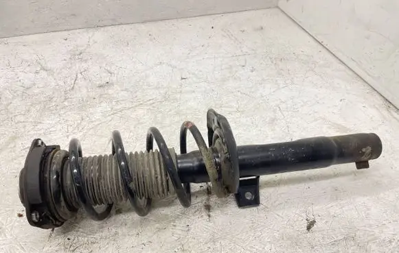 Volkswagen PASSAT B6 Front shock absorber with coil spring 1K0412331A