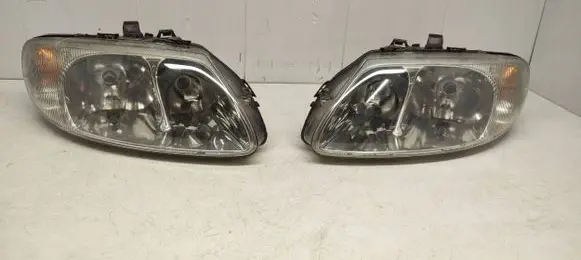 Chrysler Voyager Headlights/headlamps set 04857702ab 04857703ab