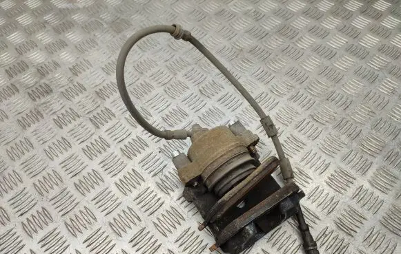 Volkswagen Golf VII Front brake caliper