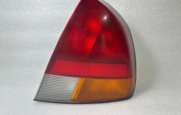 Mitsubishi Carisma Rear/tail lights MB944544 29210292
