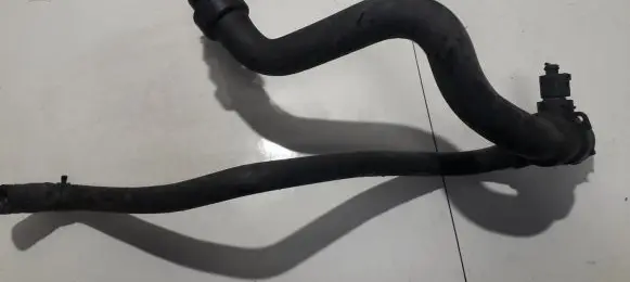 Volkswagen PASSAT B5 Engine coolant pipe/hose 06B121121