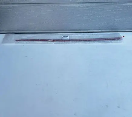 Volkswagen Tiguan Front door trim bar 5NA853332A