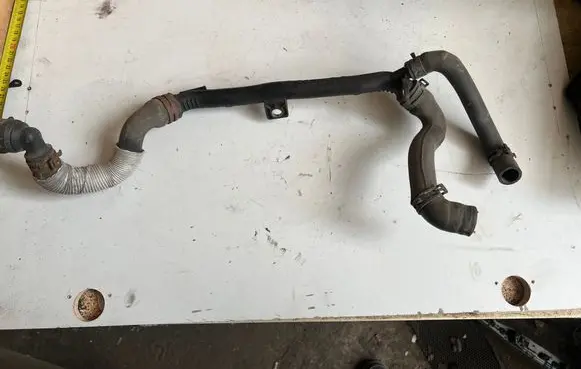 Volkswagen Polo V 6R Engine coolant pipe/hose 03P121065C