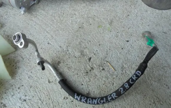 Jeep Wrangler Air conditioning (A/C) pipe/hose 68087180AB