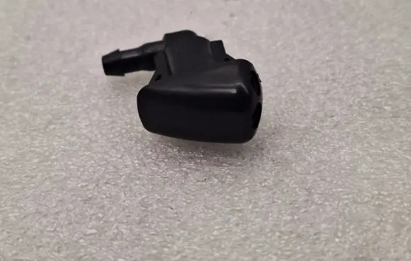 Windshield washer spray nozzle