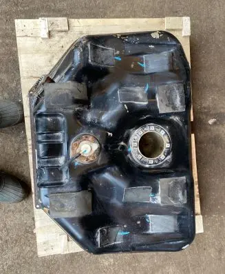 Fuel tank cap lock motor