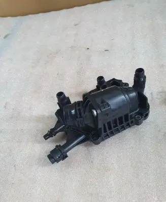 Thermostat/thermostat housing