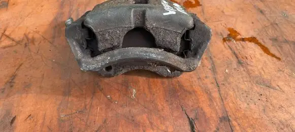 Nissan Primera Front brake caliper 25961