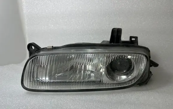 Mazda 323 F Headlight/headlamp 11061708 11081708 3315