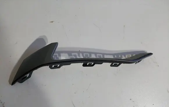 Rear bumper trim bar molding