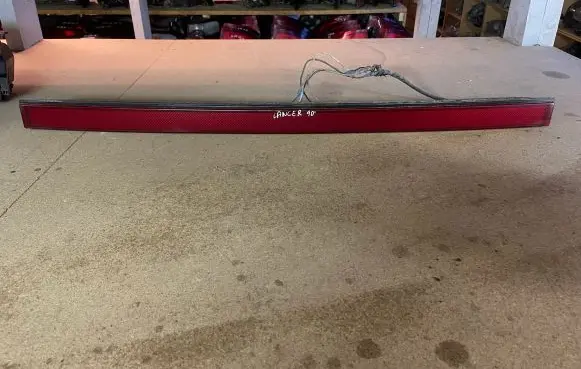 Mitsubishi Lancer Trunk door license plate light bar 