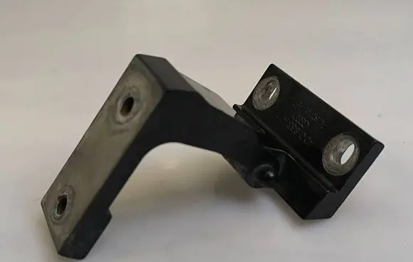Rear door upper hinge