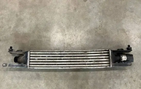 Opel Corsa D Intercooler radiator 872051000 440926702