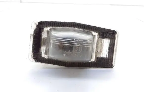 Mazda 323 F Number plate light E110384