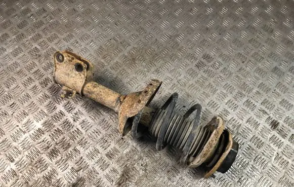 Subaru Impreza II Front shock absorber with coil spring