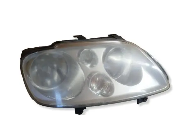 Volkswagen Touran I Headlight/headlamp 0301205202 1T0941006