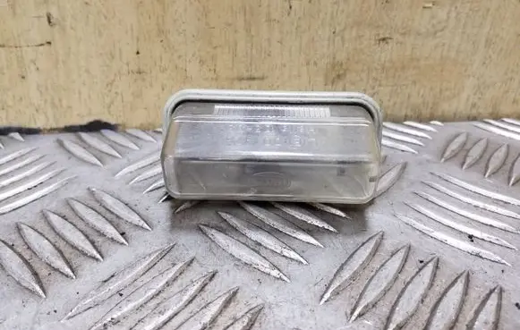 Toyota Avensis T250 Number plate light E1001479