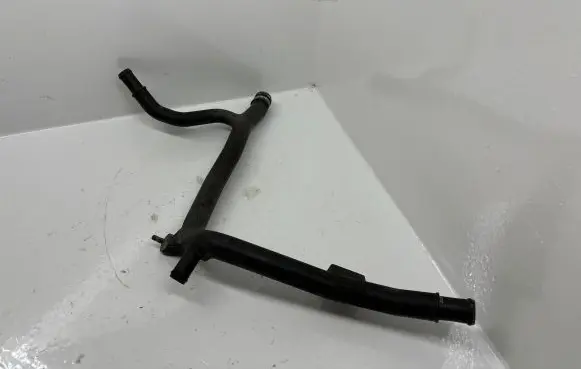 Volkswagen Golf IV Engine coolant pipe/hose 06A121065D