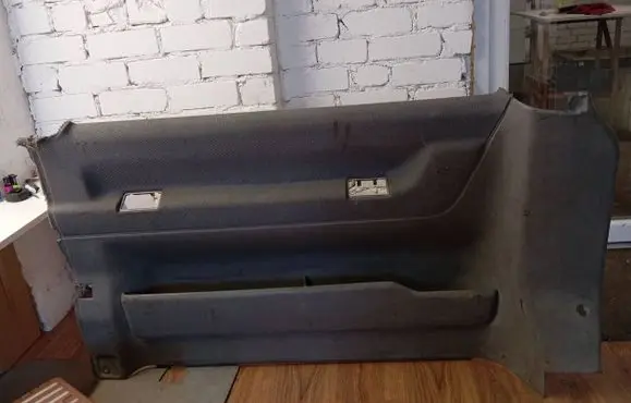 Trunk/boot side trim panel