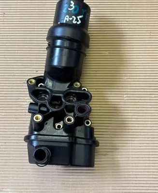 Skoda Octavia Mk2 (1Z) Oil filter mounting bracket 06F115397H