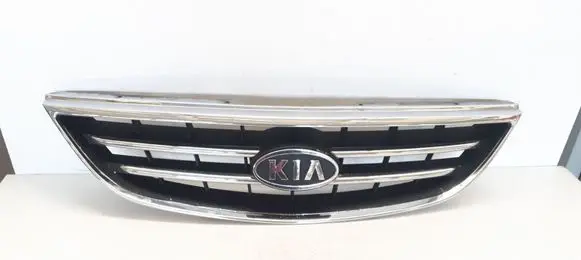 KIA Carens I Front bumper upper radiator grill