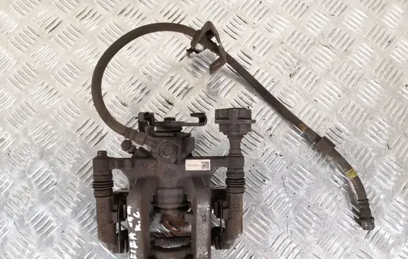 Opel Zafira C Rear brake caliper 13467365