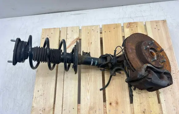Mazda 3 II Front shock absorber with coil spring