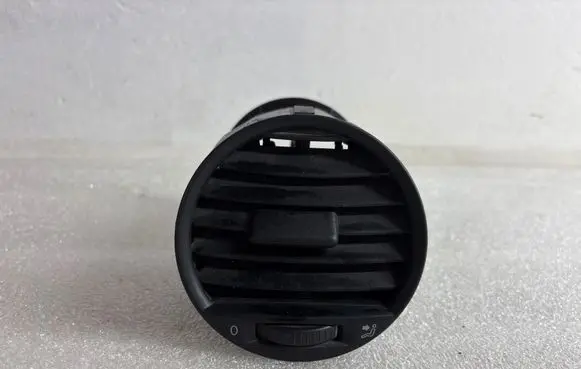 Volkswagen Caddy Dash center air vent grill 2K0819703B