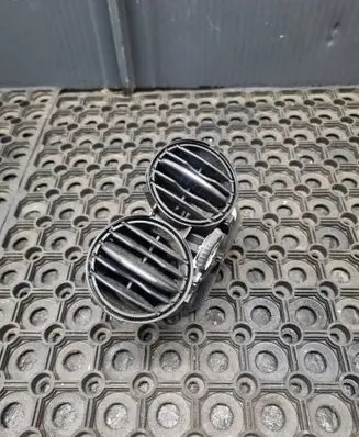 Dash center air vent grill