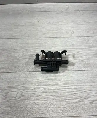 Coolant heater control valve