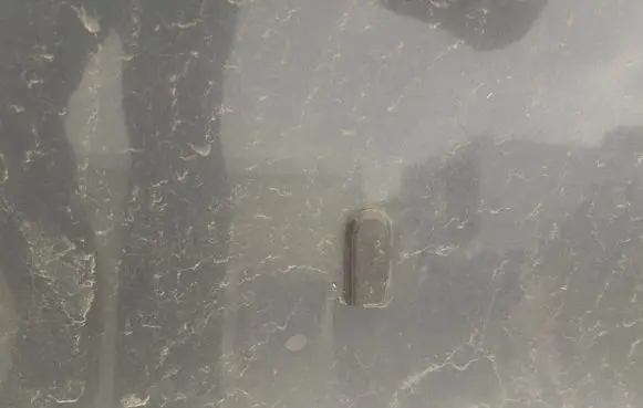 Windshield washer spray nozzle