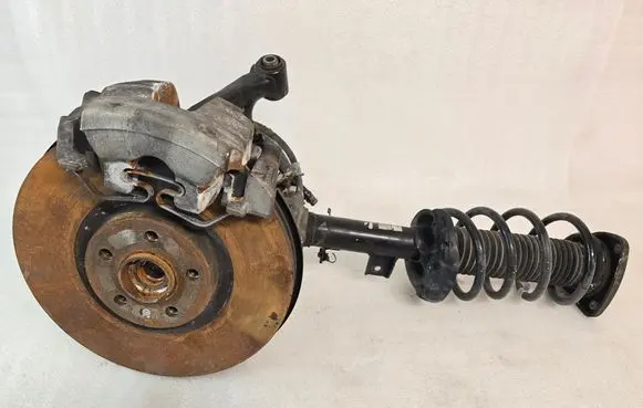 Front wheel hub spindle knuckle