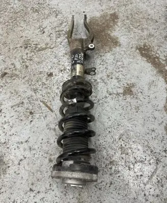 Front shock absorber with coil spring