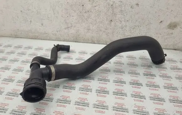 Volkswagen Touareg I Engine coolant pipe/hose 7L6122291A