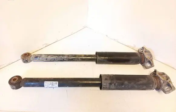 Opel Astra J Rear shock absorber/damper 13279267
