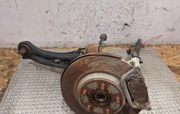 Rear wheel hub spindle/knuckle