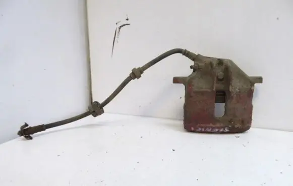 Renault Scenic I Front brake caliper 7701205833