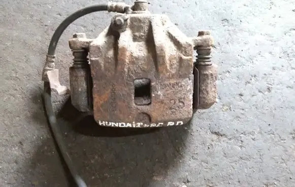 Hyundai Coupe Front brake caliper