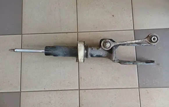 Volkswagen Touareg I Front shock absorber/damper 7L6412021M