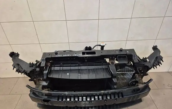 Radiator support slam panel