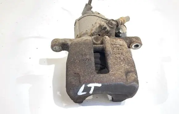 Volkswagen PASSAT B7 Rear brake caliper 