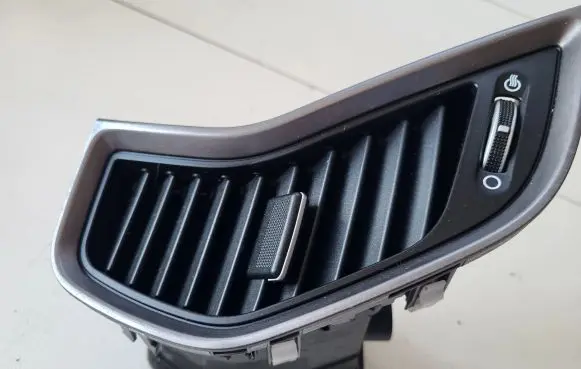Hyundai Santa Fe Dash center air vent grill 974102W000