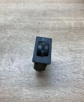 Headlight level height control switch