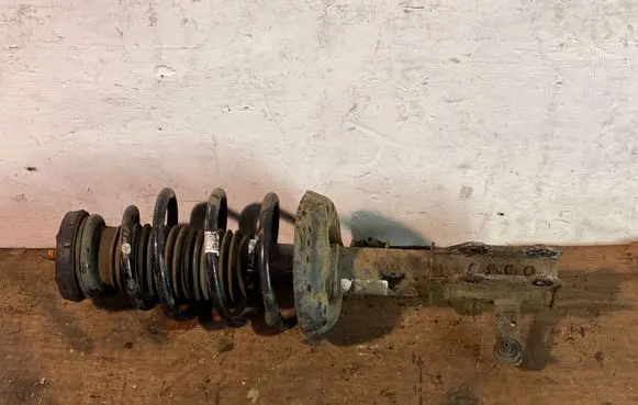 Opel Astra J Front shock absorber with coil spring