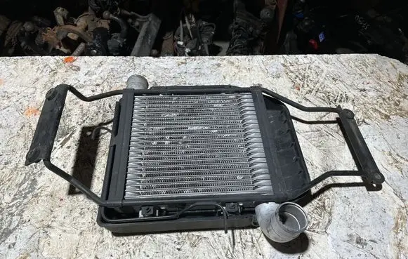 KIA Carens I Intercooler radiator 2827127350