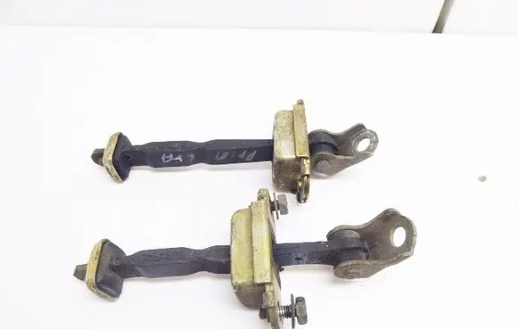 Nissan Primera Rear door check strap stopper