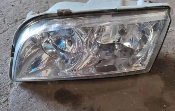 Volvo S40, V40 Headlight/headlamp 7731109L